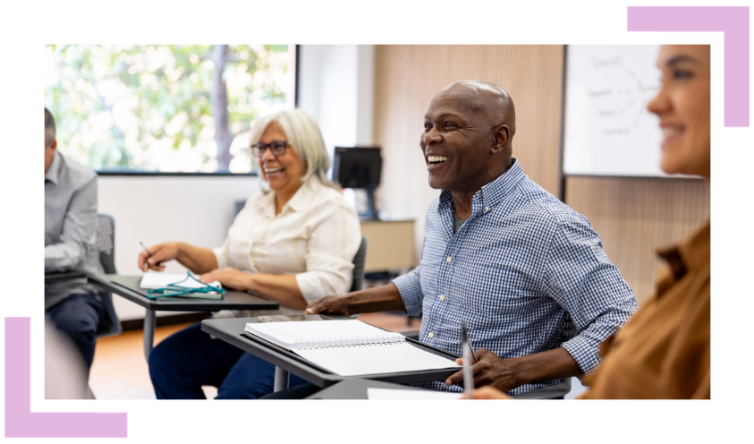 Professionals enjoying learning in a classroom environment