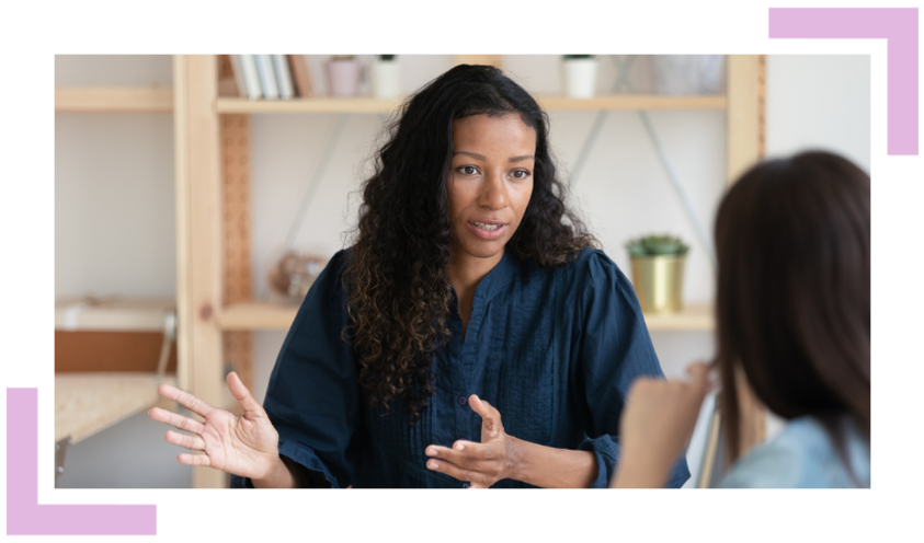 Person explaining something to another person
