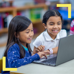 two students smiling 