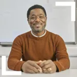 Educator sitting at a desk