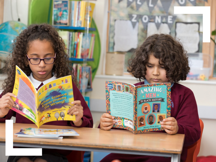 Two children reading books