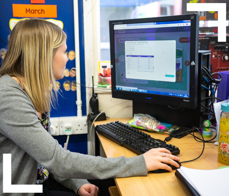 teacher at computer completing CPD course