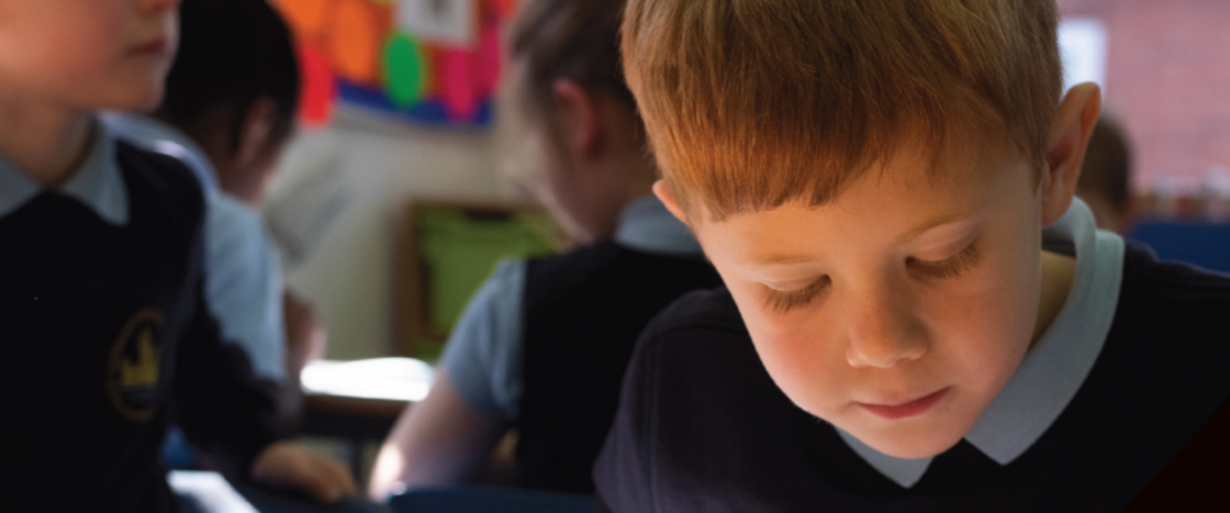 primary school child doing work