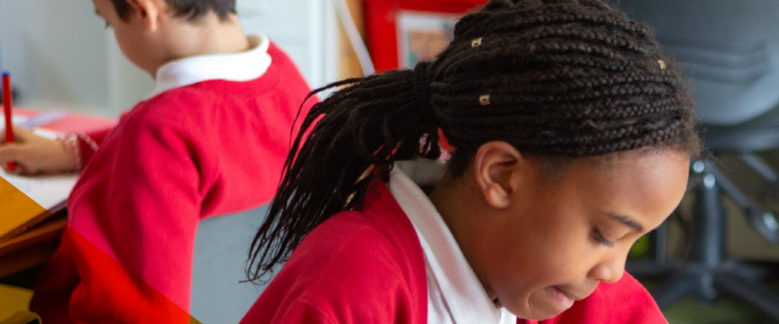 child doing school work in class
