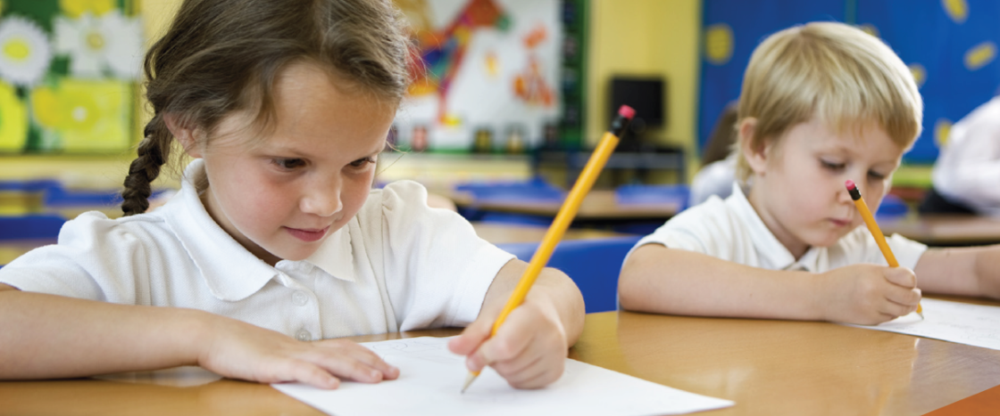 two primary school children in class